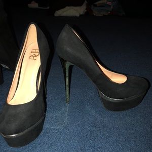 Black high heels with gold heel